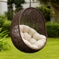 Sedia sospesa in rattan sintetico con cuscino beige