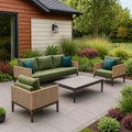 Set salotto da giardino in rattan sintetico con cuscini verdi